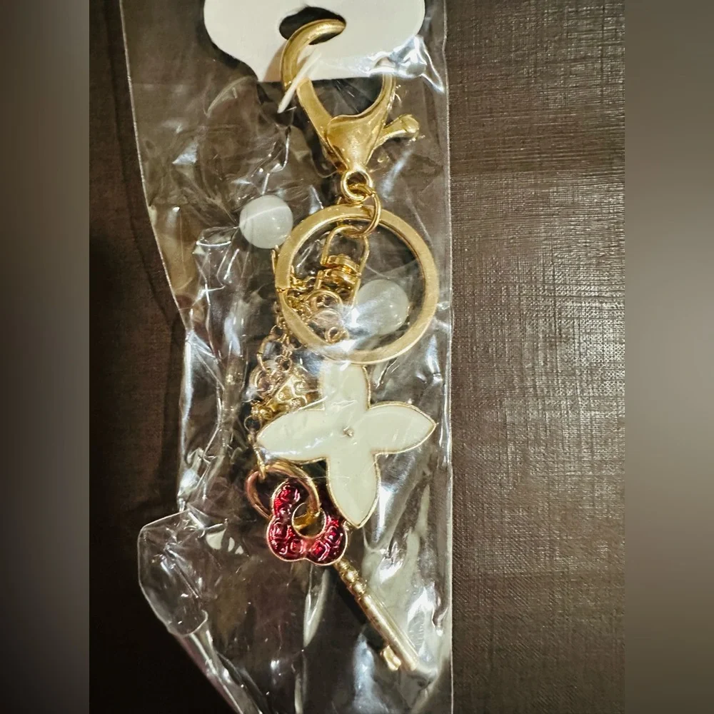 Colorful Gold Keychain with Floral and Clover Charm Design-$10 each